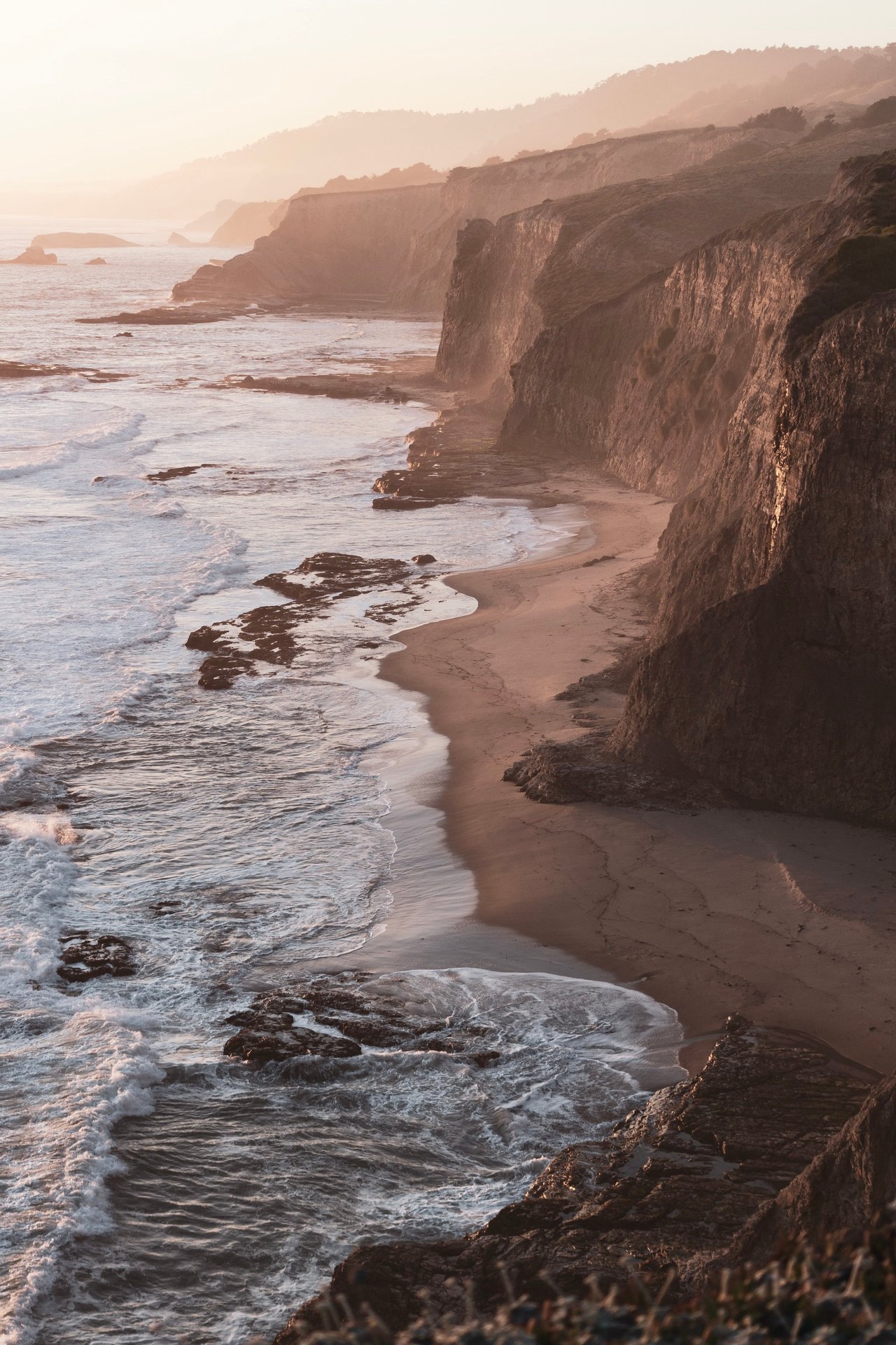 Aerial view of Malibu coastline at sunset.