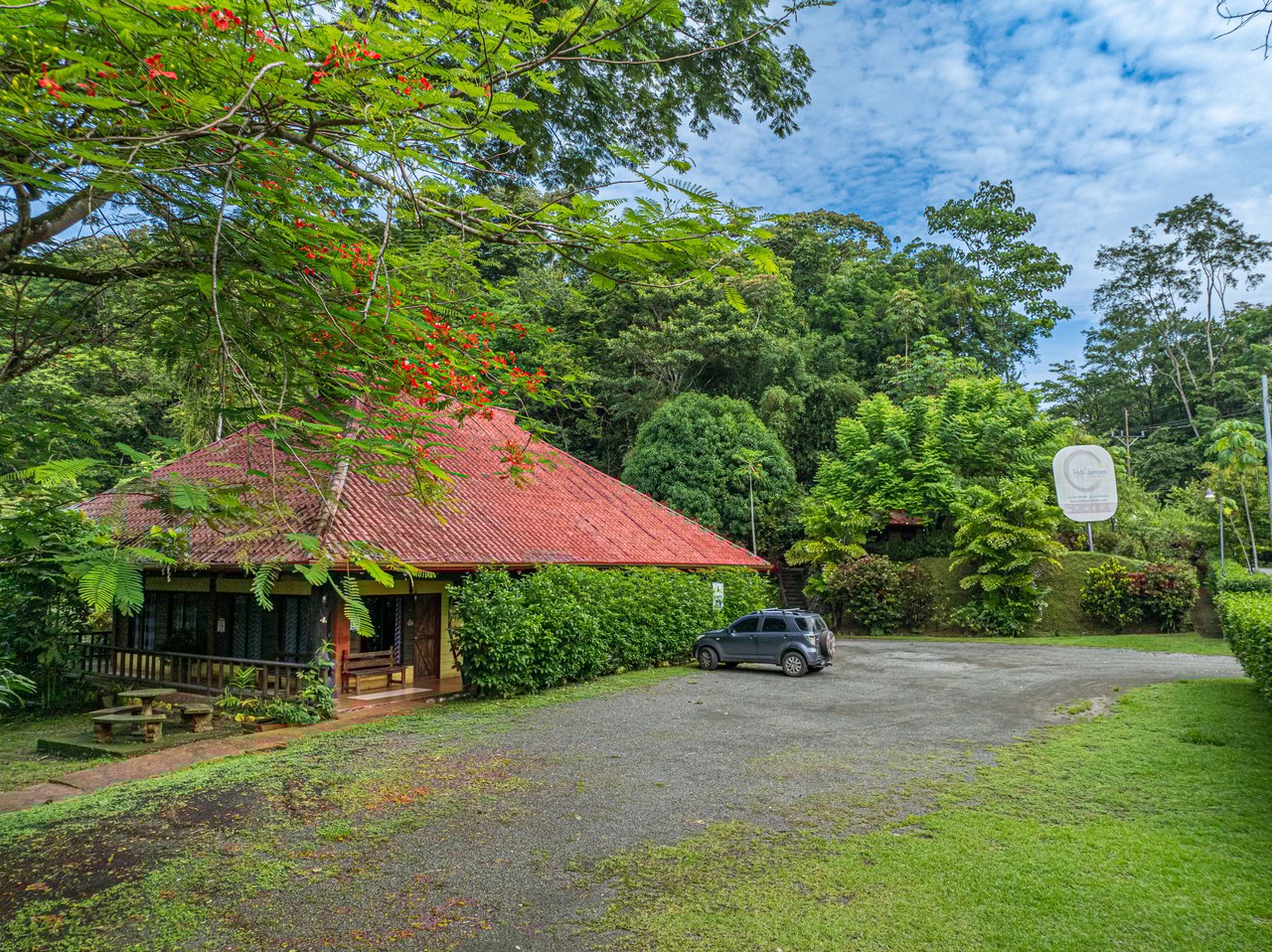 10-Acre Uvita Commercial Property with Existing Hotel & Highway Frontage – Development Potential Near the Beach