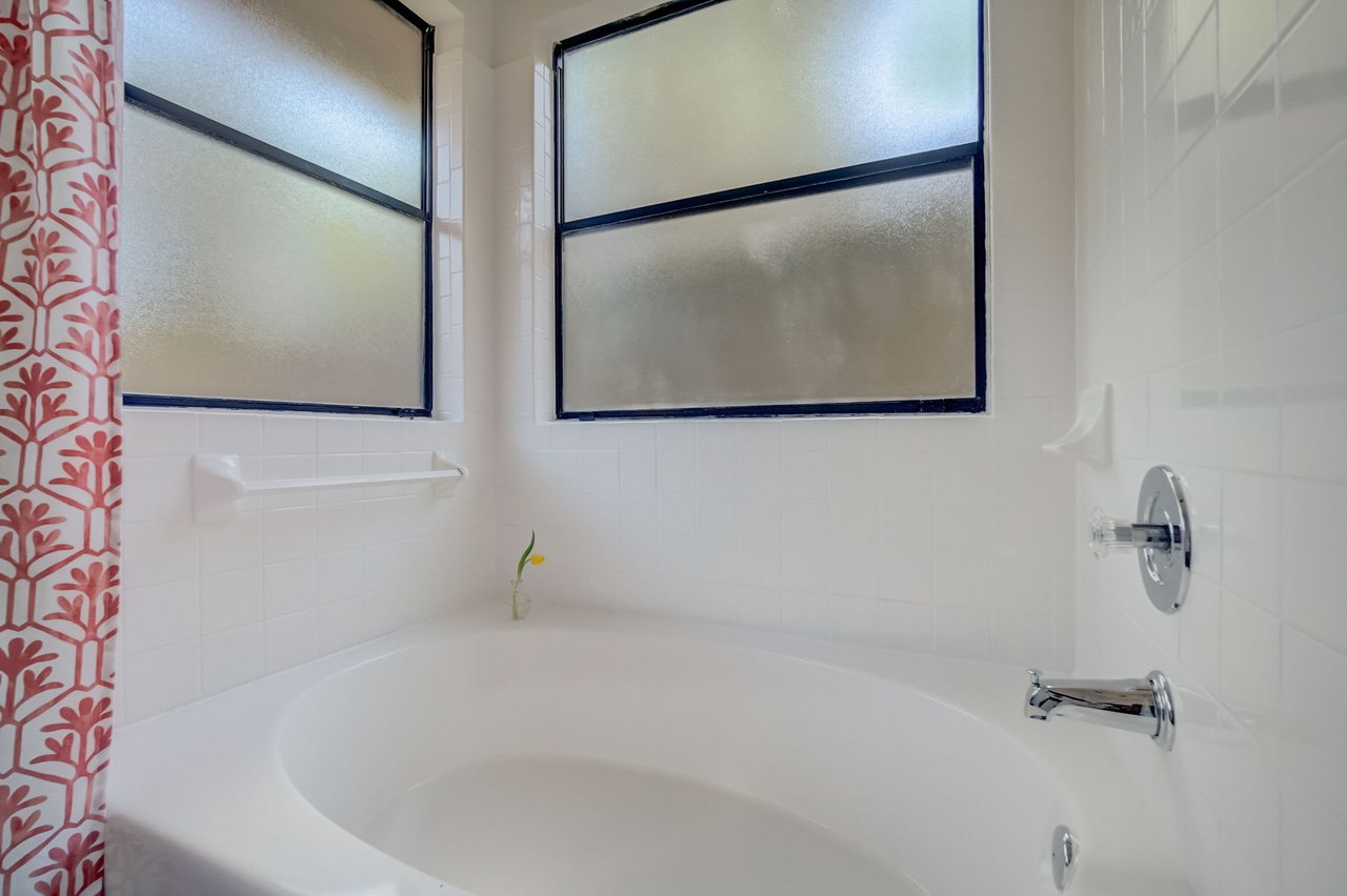 Charming Milwood Home: Updated Single-Story Gem with In-Law Plan & New Roof!