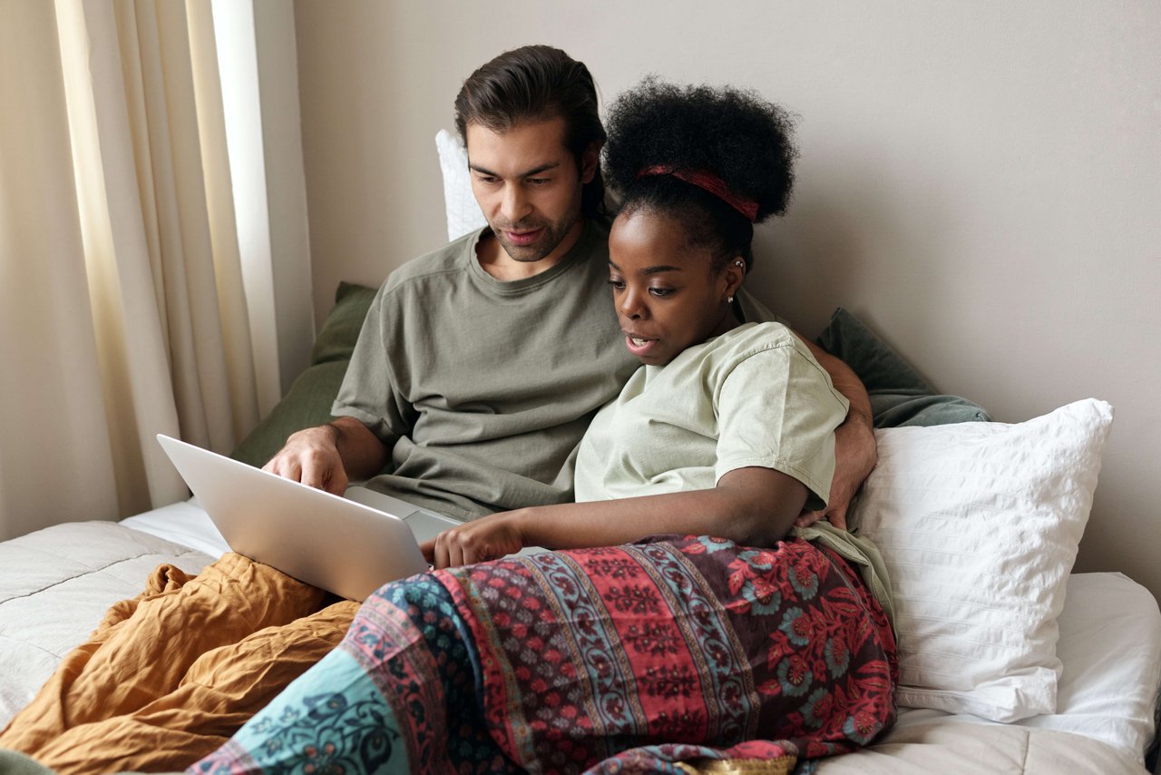 couple choosing a home to buy