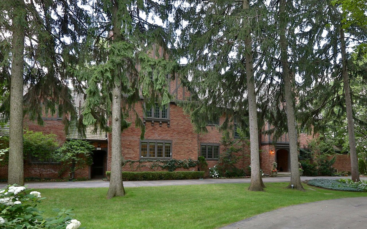 beautiful home with lawn and pine trees in Rosedale