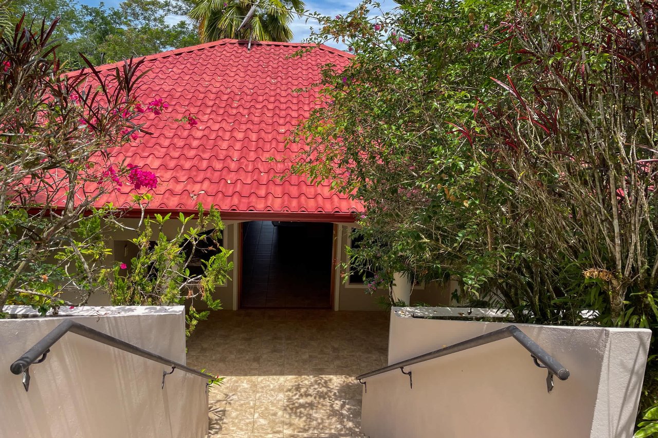 Turnkey Spacious Home with Open Layout, Pool & Small Ocean View in Ojochal Gated Community