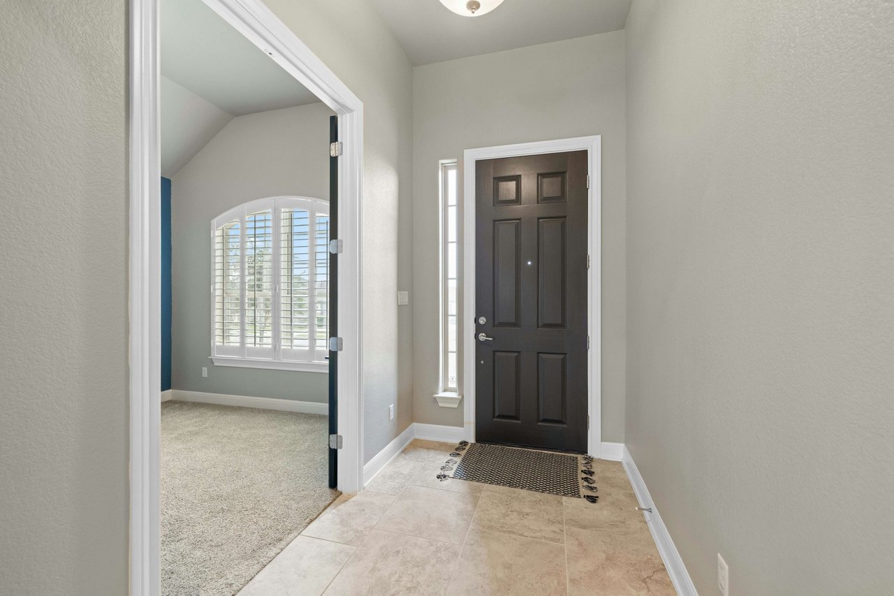 Impeccably Maintained 1-Story Taylor Morrison Home with Luxurious Amenities in Desirable Travisso Neighborhood!