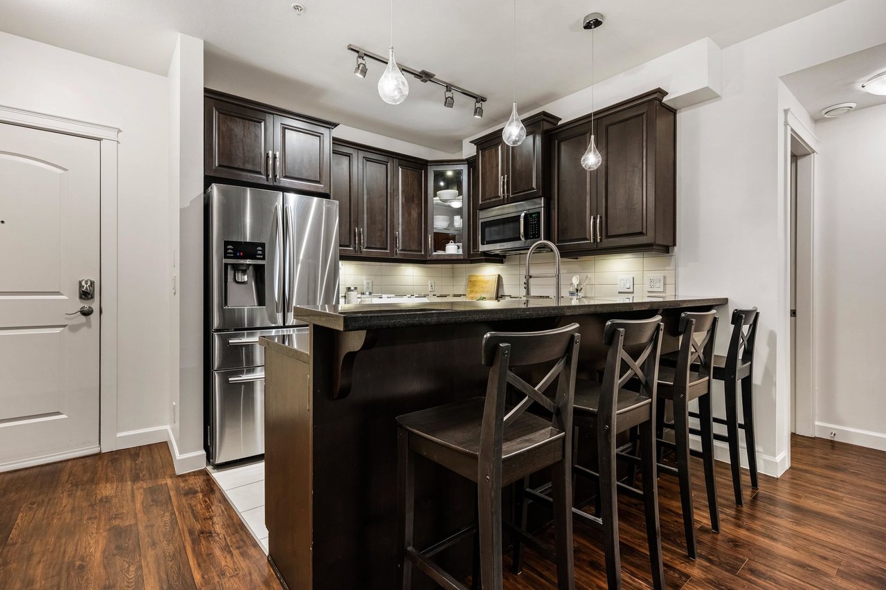 154-8328 207a St