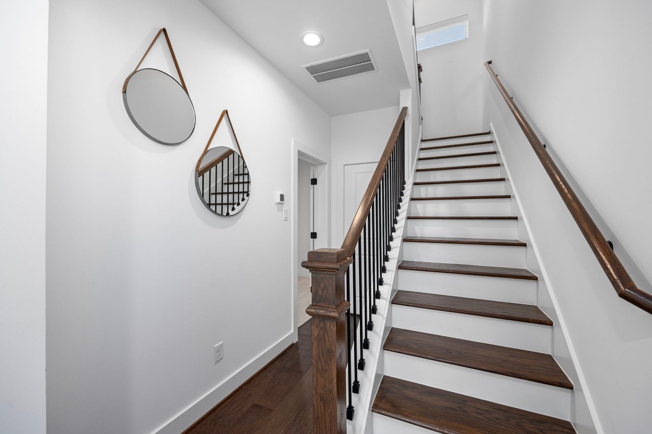 front staircase at an Eastwood Estates home