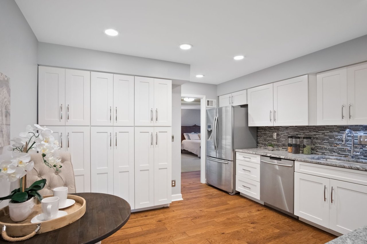 Closed in 24 Days for 7% Over List Price! First Floor Condo Living Overlooking Golf Course 