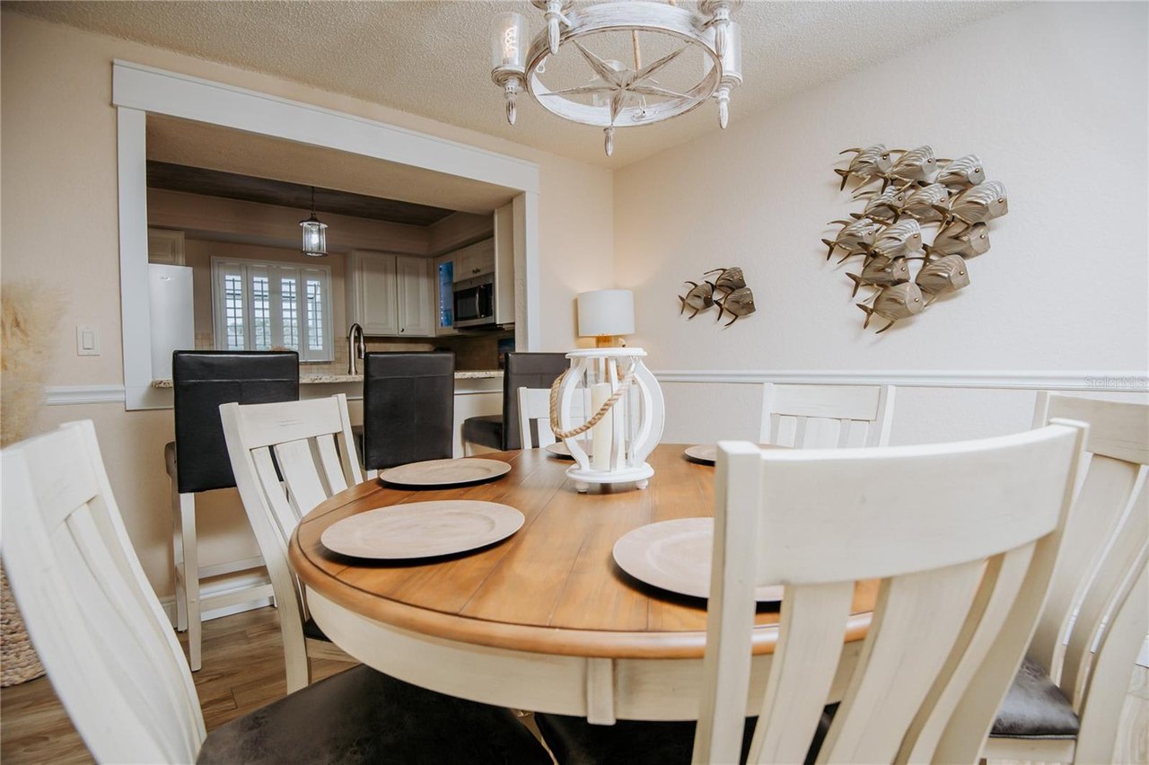 11722 Currie Lane, Caribbean Cove, Largo Florida, luxury townhome, brokers open, Avaymaria Brown, The Tranquil Realtor, Pinellas real estate, multi-level townhome, outdoor deck, no CDD fee, exclusive listing, real estate professionals, Florida homes, investment opportunity, property showcase.