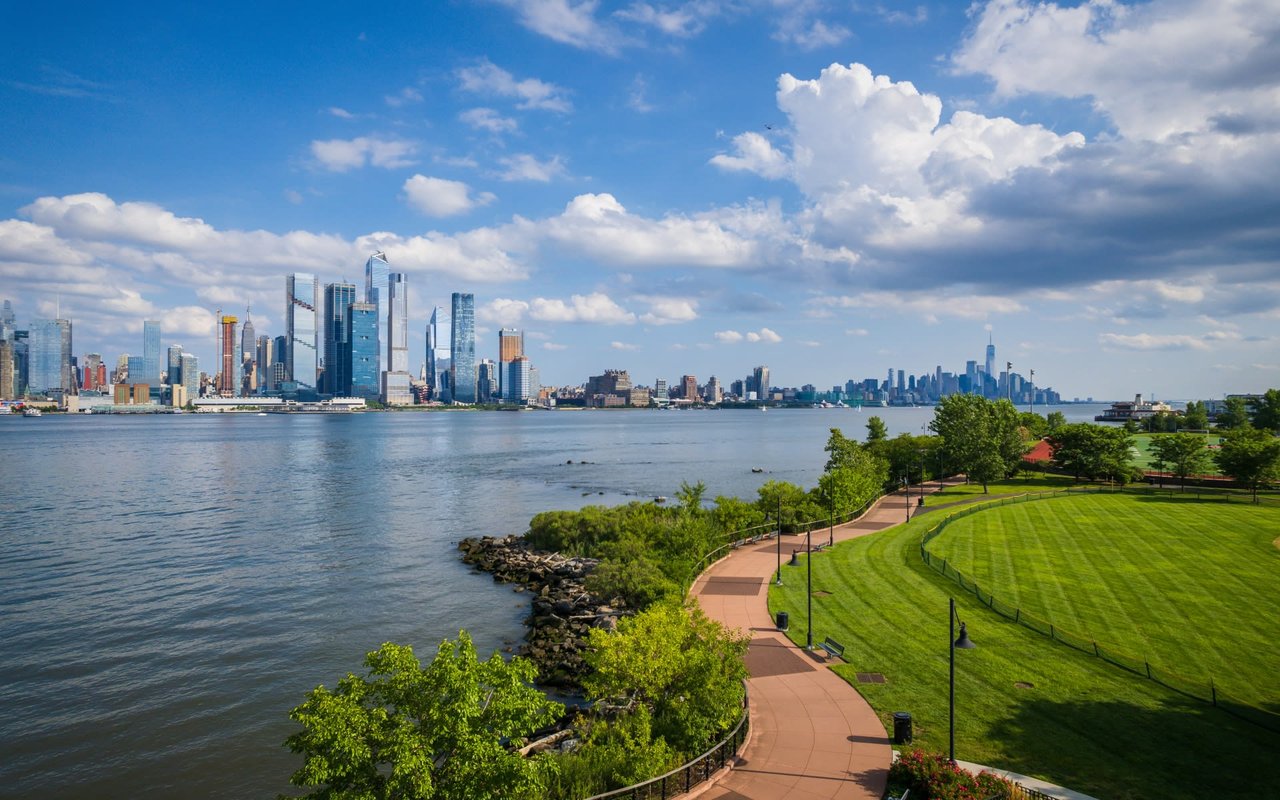 A view of a city skyline from across a river