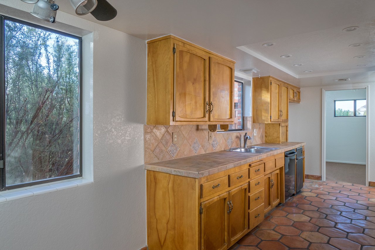 SITUATED IN THE DESIRABLE VISTA DE LAS CANDELAS ESTATES