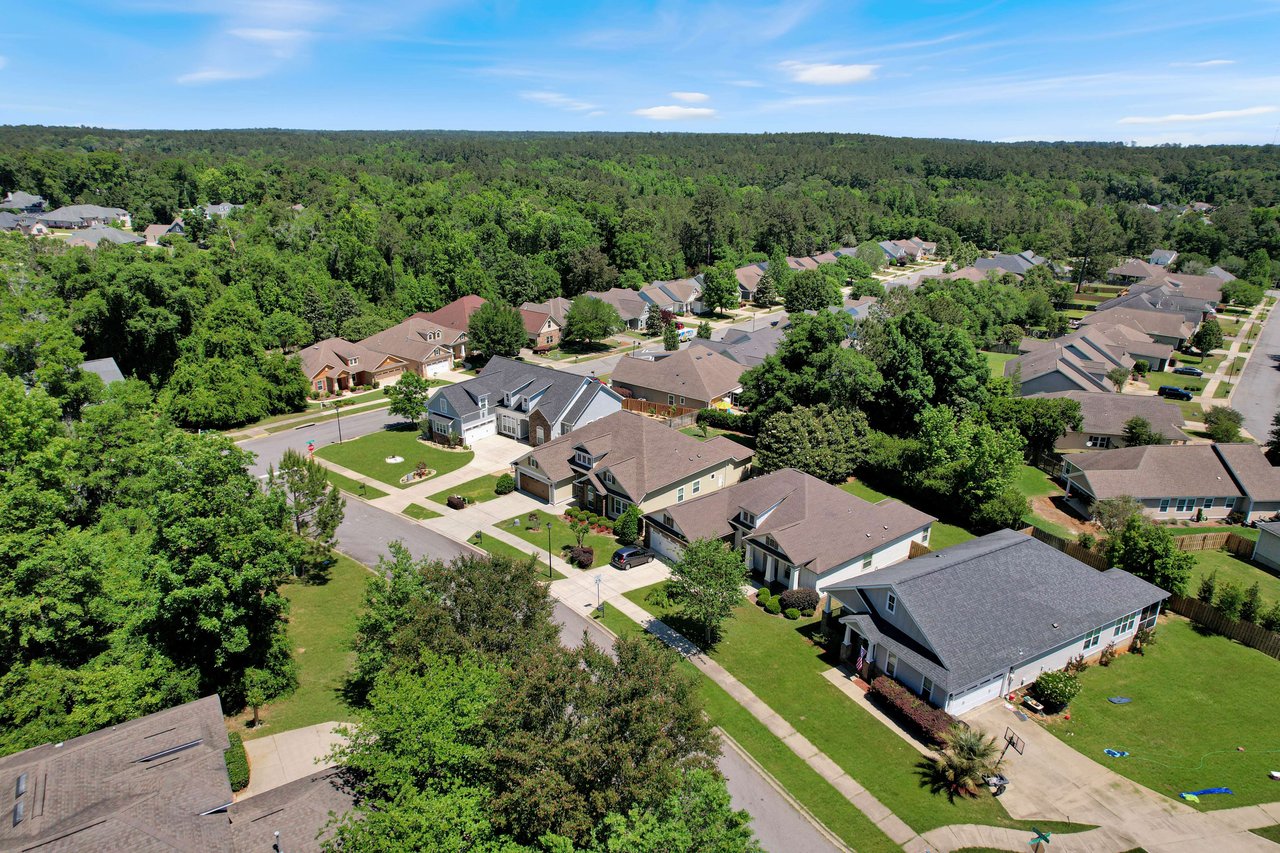 Another aerial view of Bull Run, showing the layout of houses and streets amidst greenery.