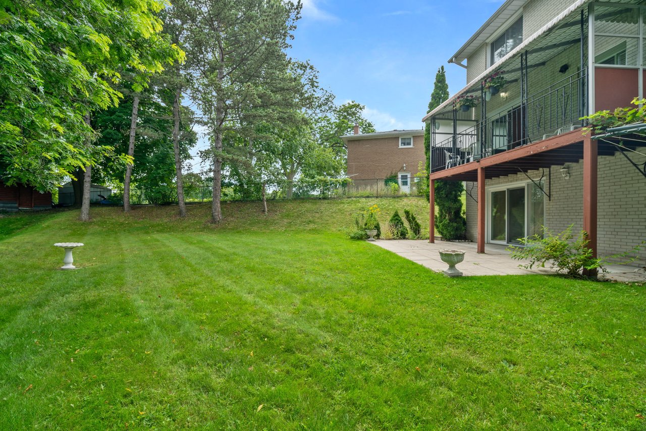 SOLD: Coveted Bayview Woods