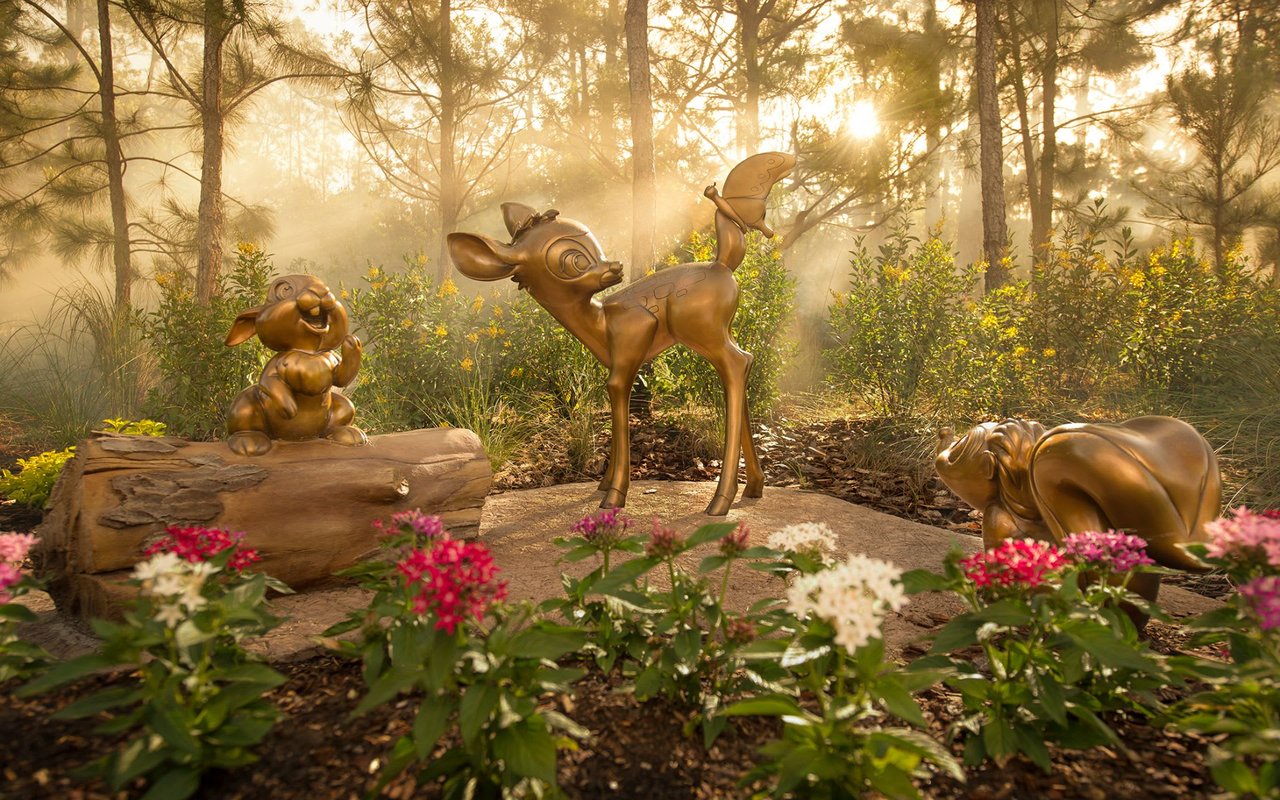 Golden sculpture of Bambi and friends at Disney's Golden Oak neighborhood