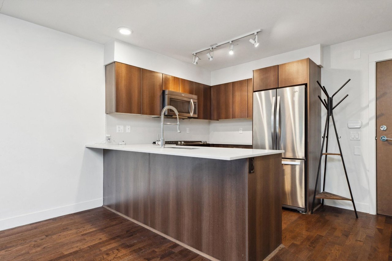 107-7088 14th Ave
