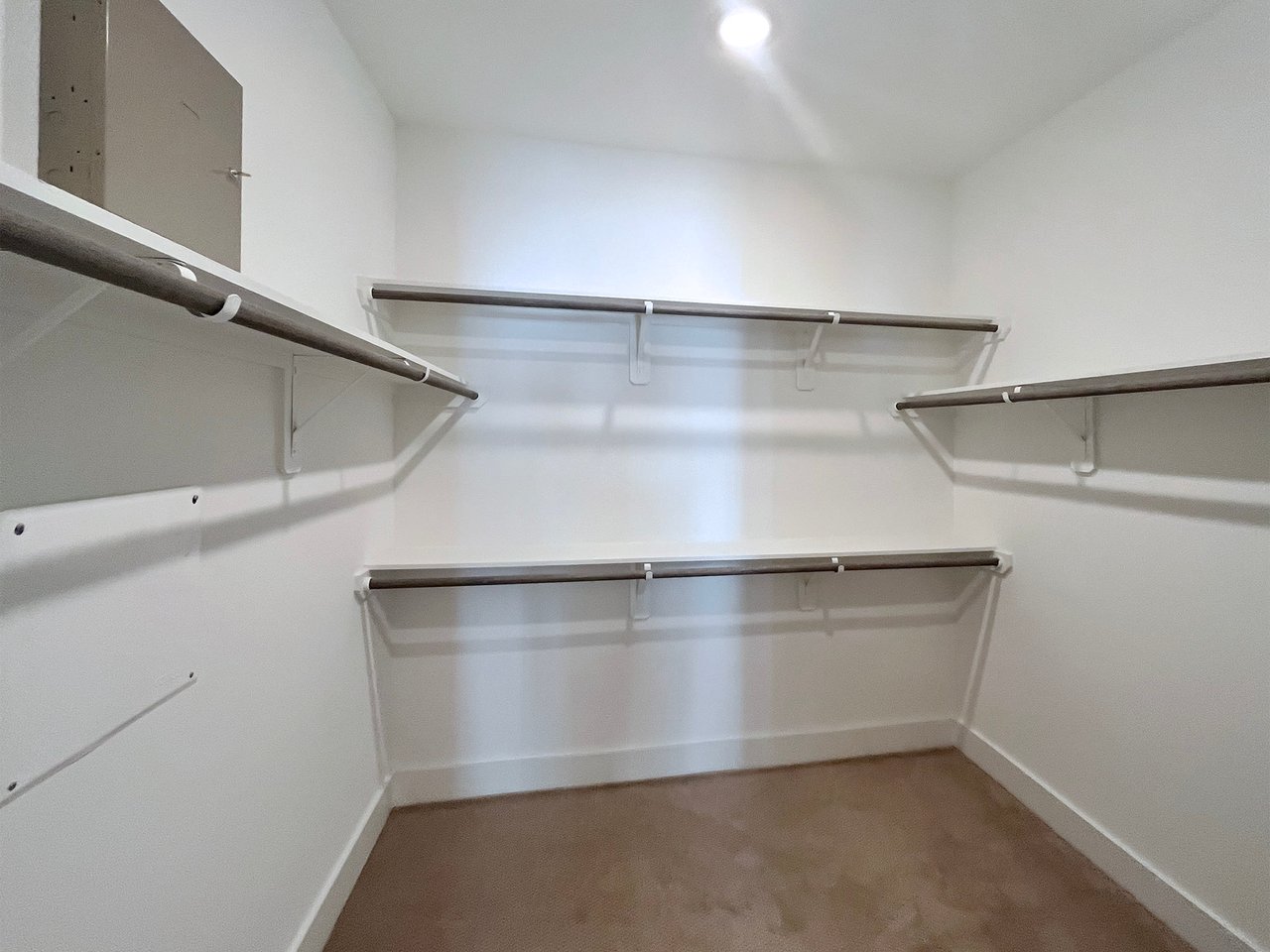 large walk-in closet with storage 