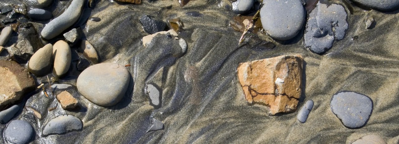 Sand and rocks on the beach near Avenue U in Seaside Oregon