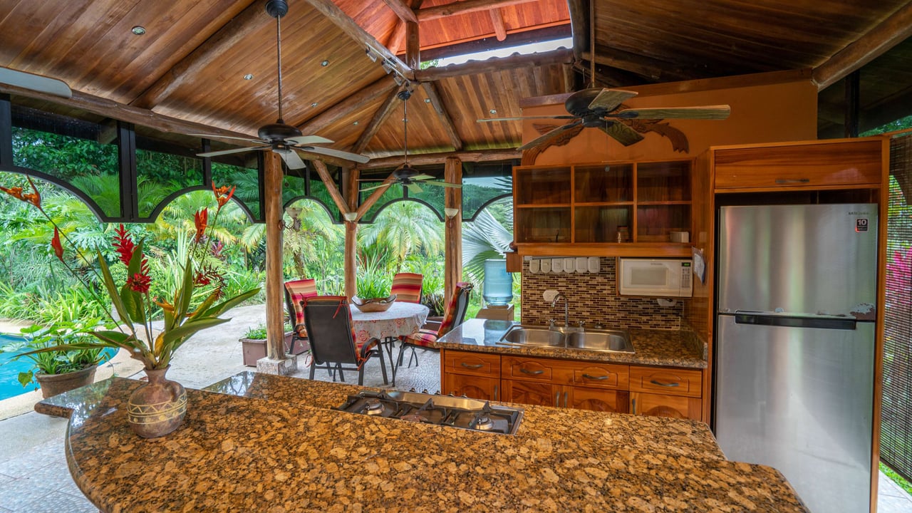 Stunning Tropical Home in Gated community with Hundreds of fruit trees  