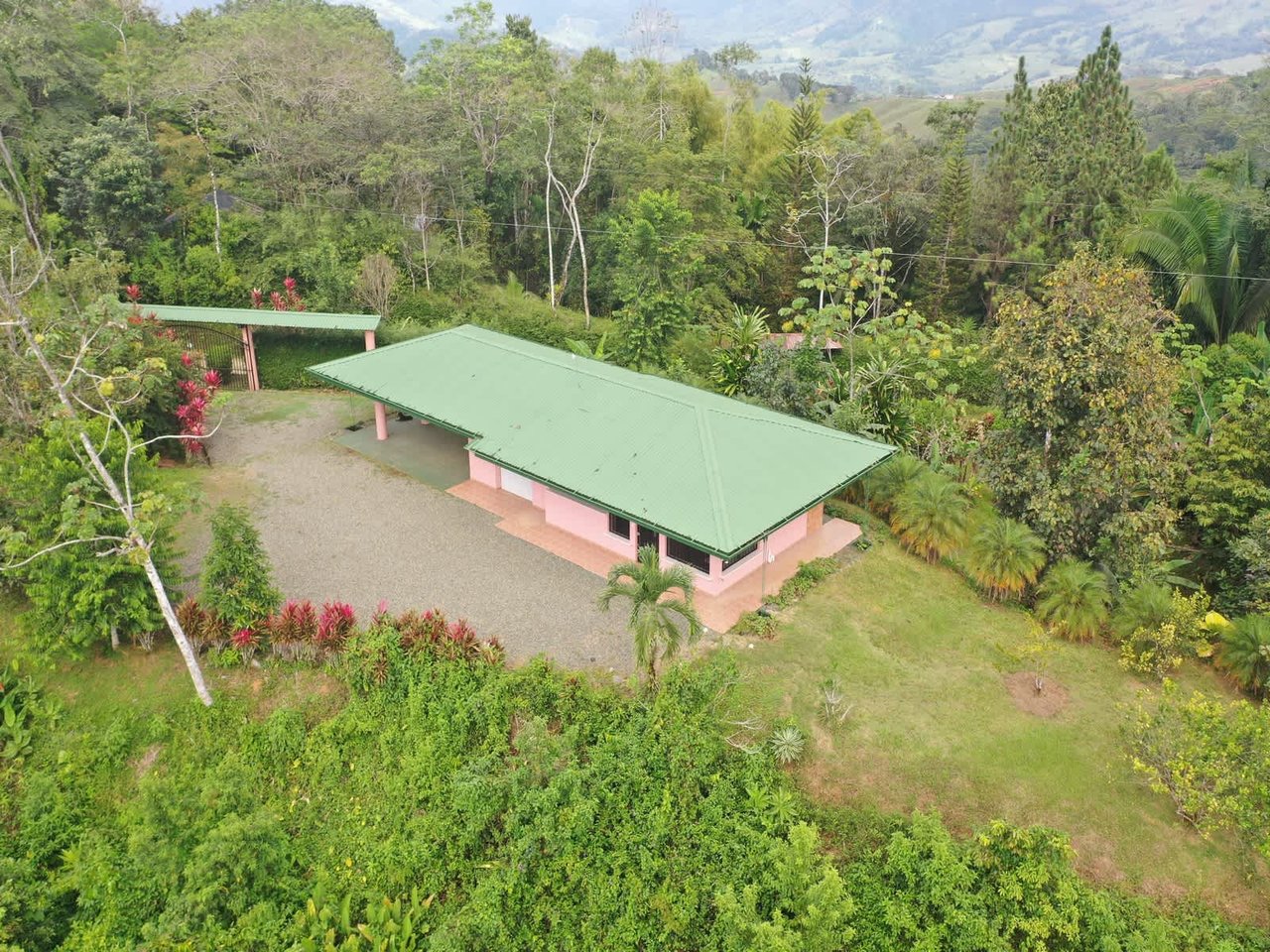 5.2 ACRES – 2 Bedroom Home With 60 Ft Infinity Lap Pool, 1 Bedroom Guest House, Fabulous Ocean View, Mature Fruit Trees!