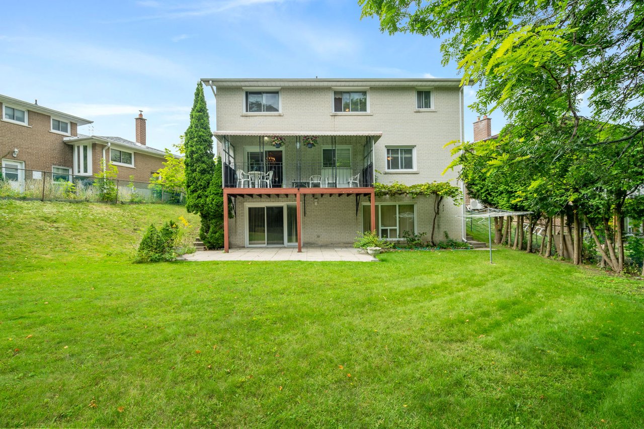 SOLD: Coveted Bayview Woods