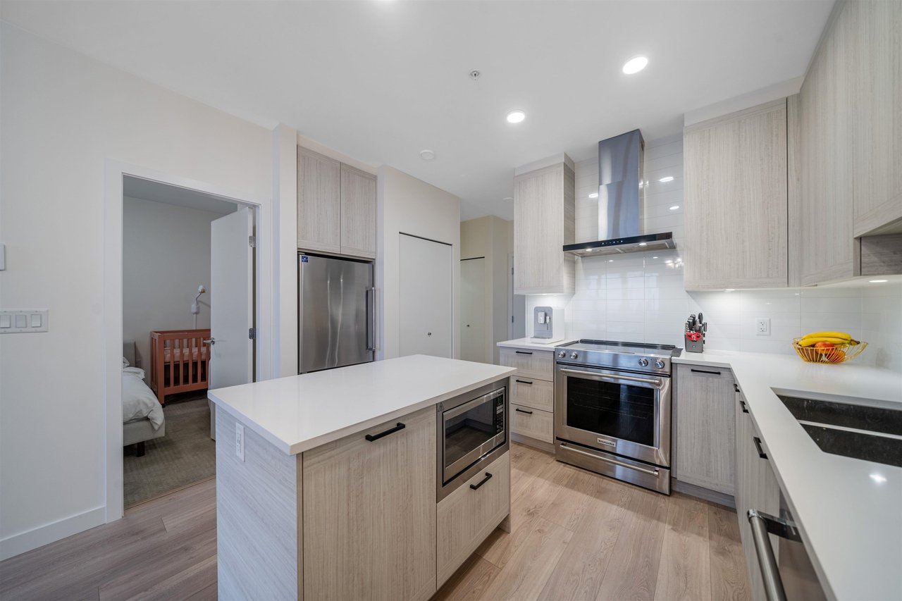 606-7169 14th Ave