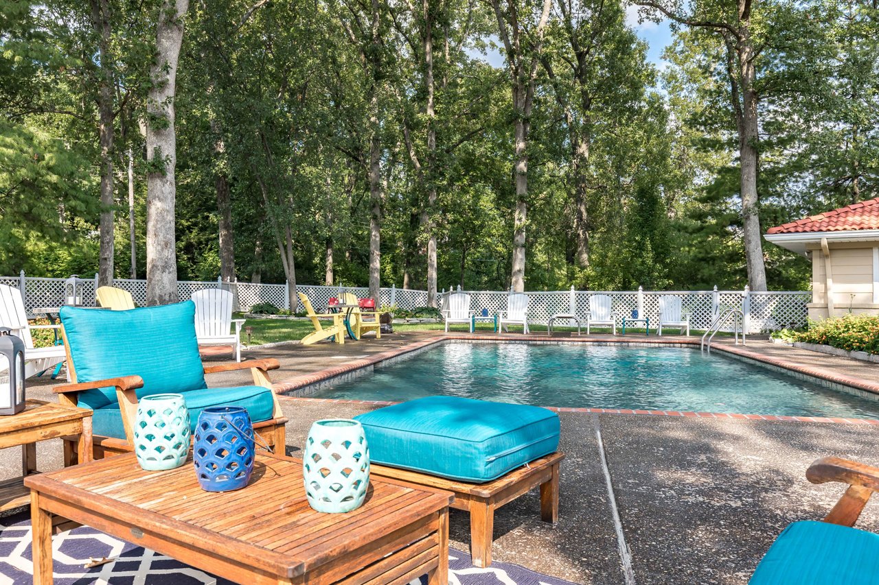A Special Retreat on a Prized One Acre Lot With Pool and Tennis Court