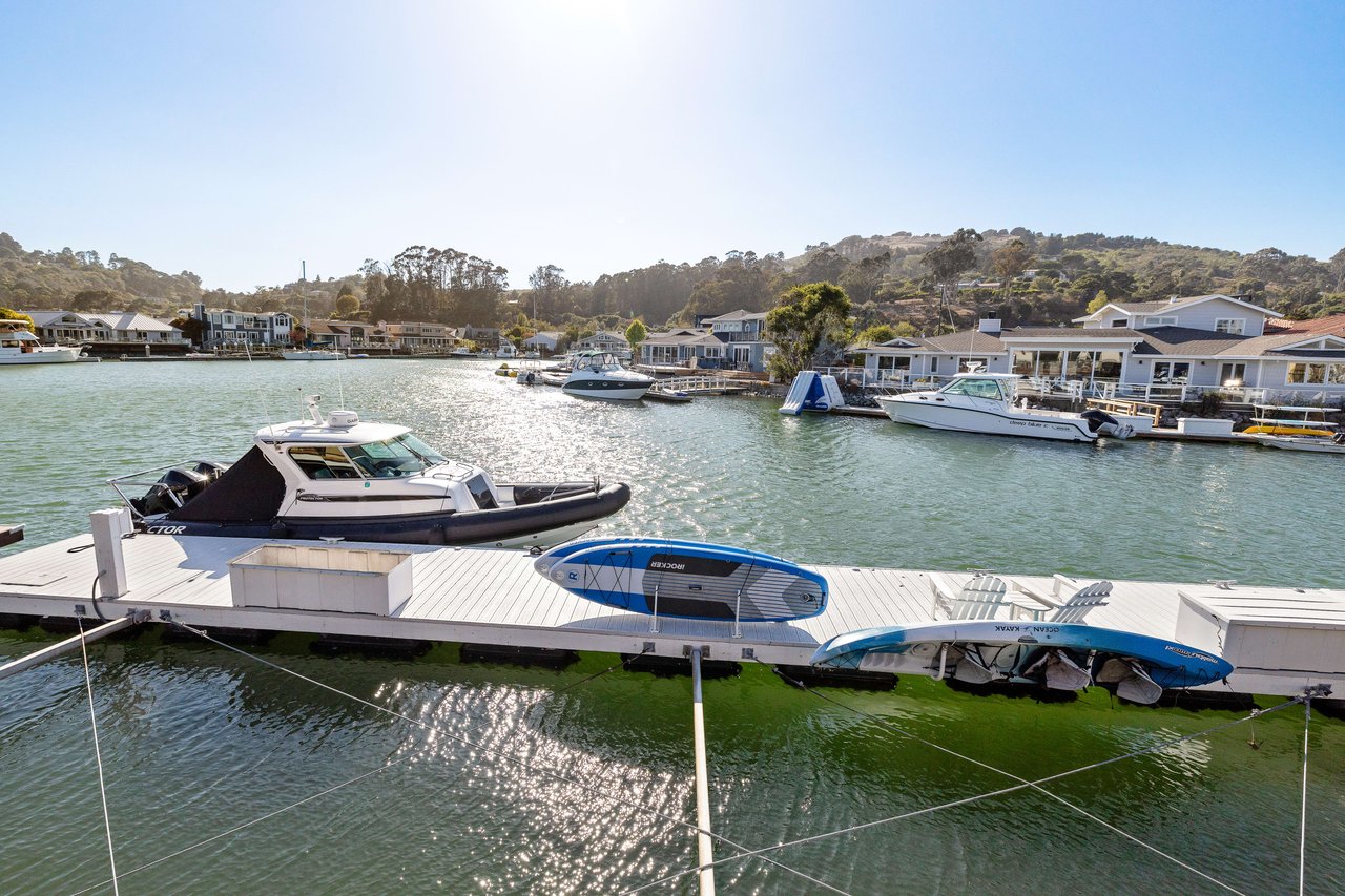 Sun-Drenched Home on Coveted Water Cul-de-Sac- Represented Buyer