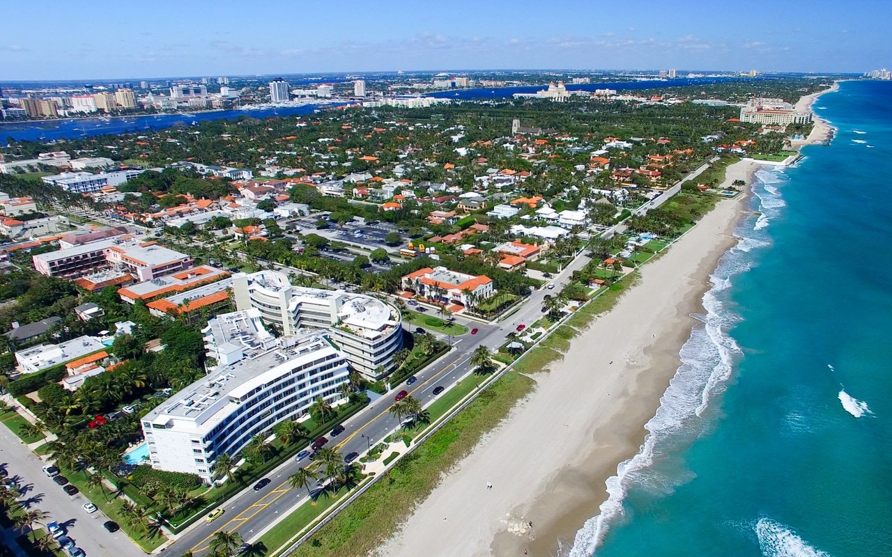 An aerial view of a city along the beach