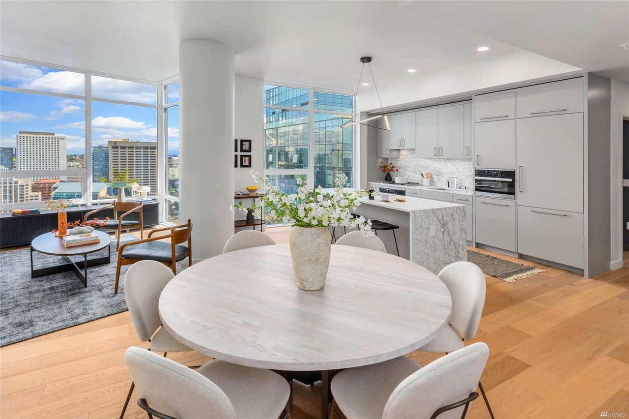  Contemporary kitchen and dining room in upscale city residence.