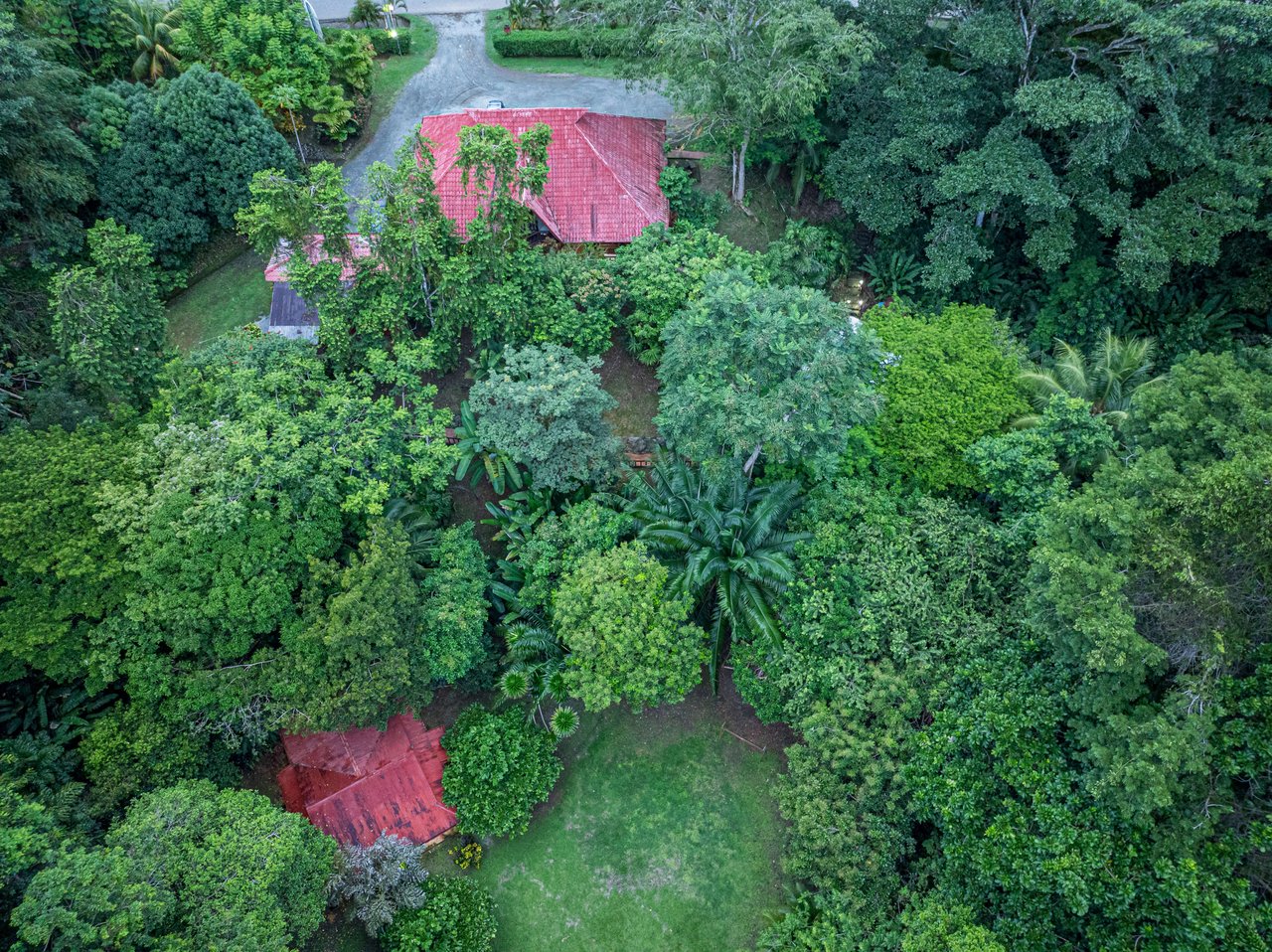 10-Acre Uvita Commercial Property with Existing Hotel & Highway Frontage – Development Potential Near the Beach