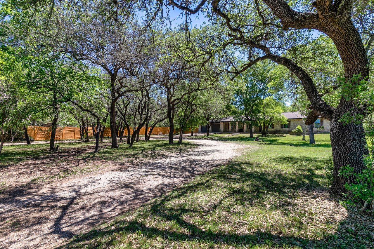 Updated, unrestricted Hillcountry Gem nestled in the Live Oak Trees