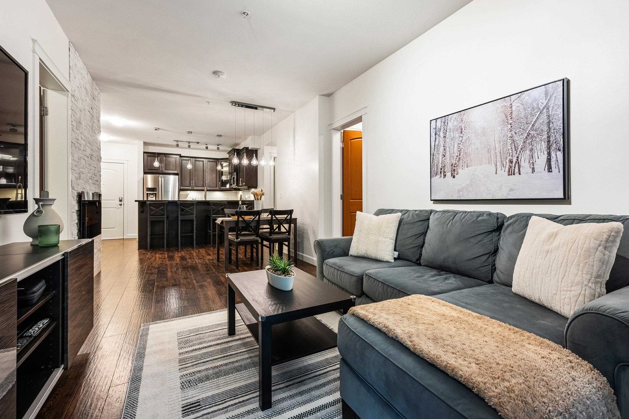 154-8328 207a St