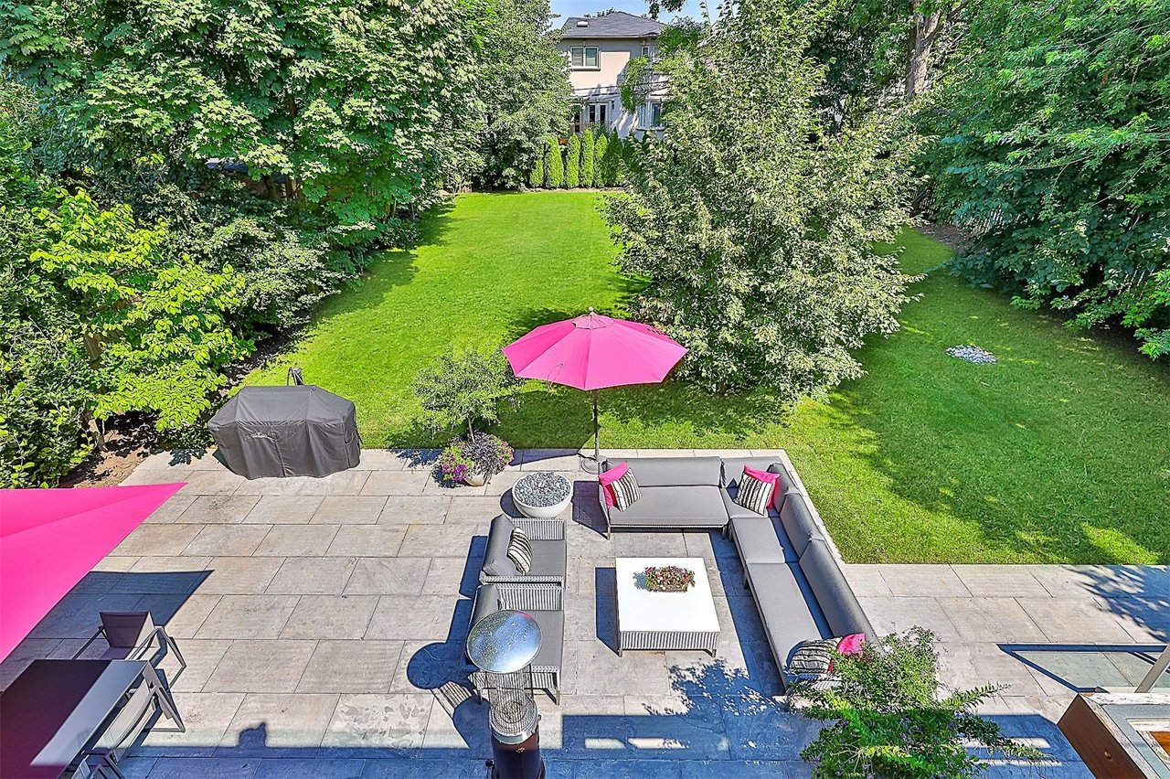 SOLD: Stunning and Sleek Design Built On Spectacular Lush Pie Shaped Lot