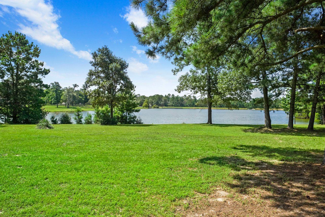 2.1 acres on private lake in Crown Oaks!