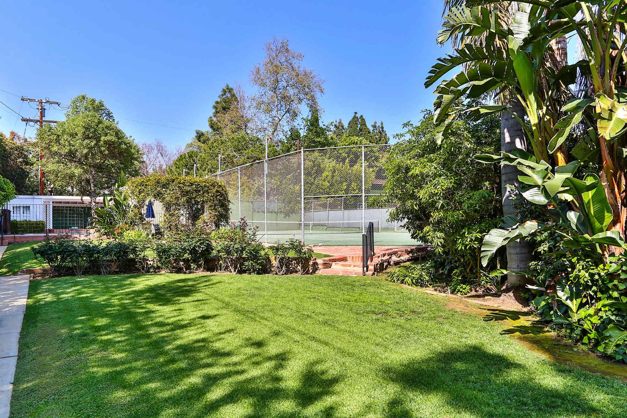 Traditional Tennis Court Estate in the Park