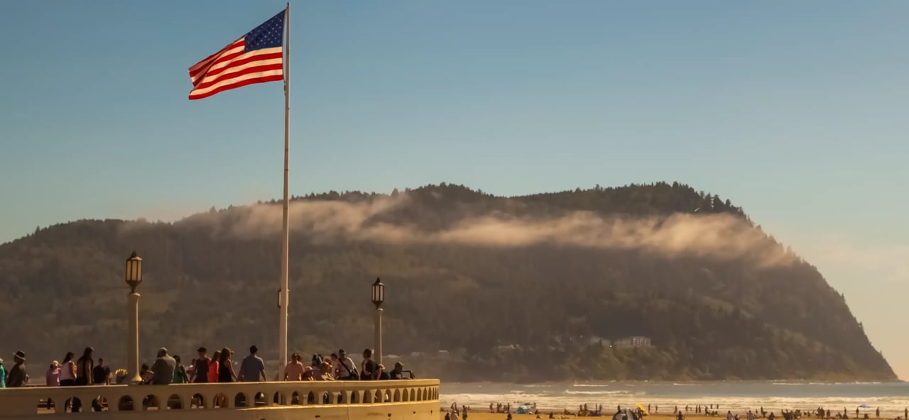 American Flag on Broadway Street with Tillamook Head in the background