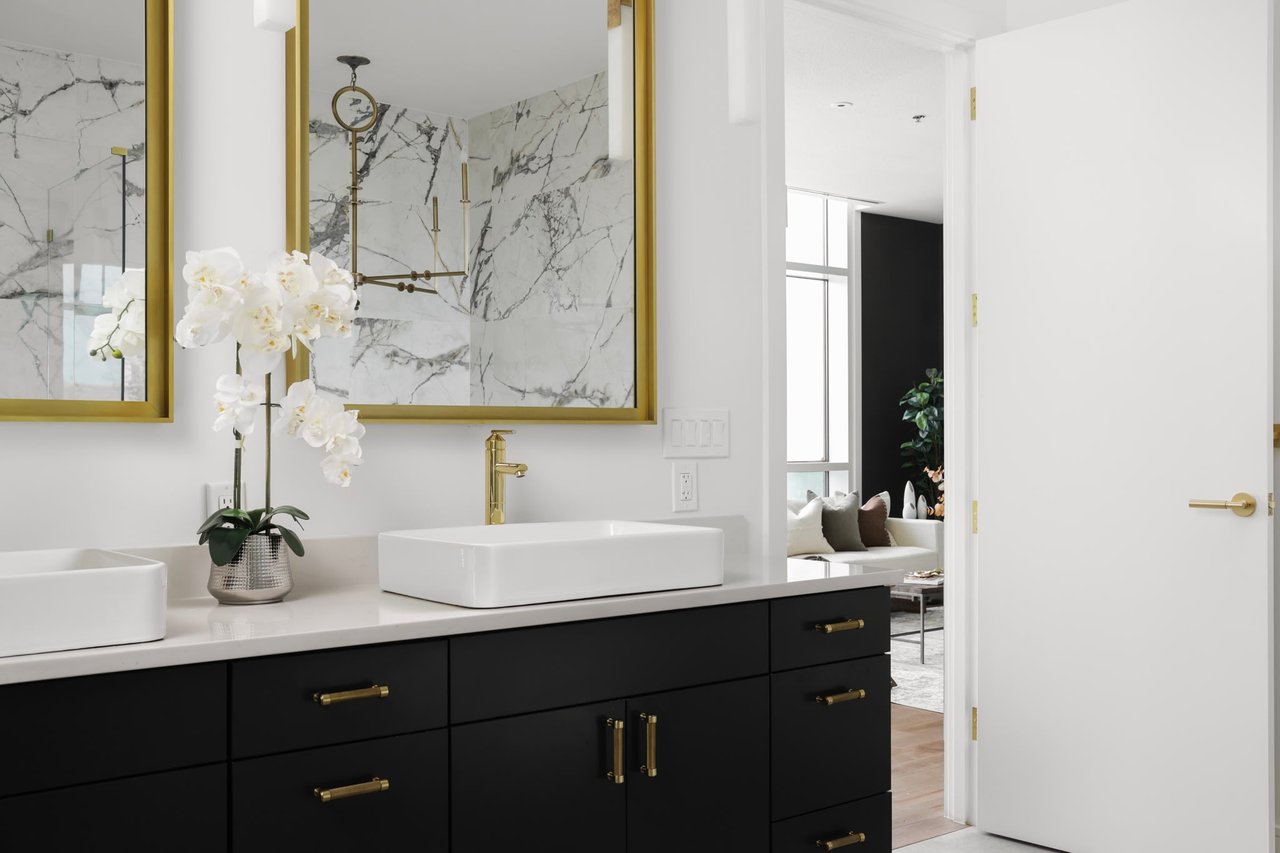 Spacious and modern primary bathroom with luxury furniture rentals from Elite Austin