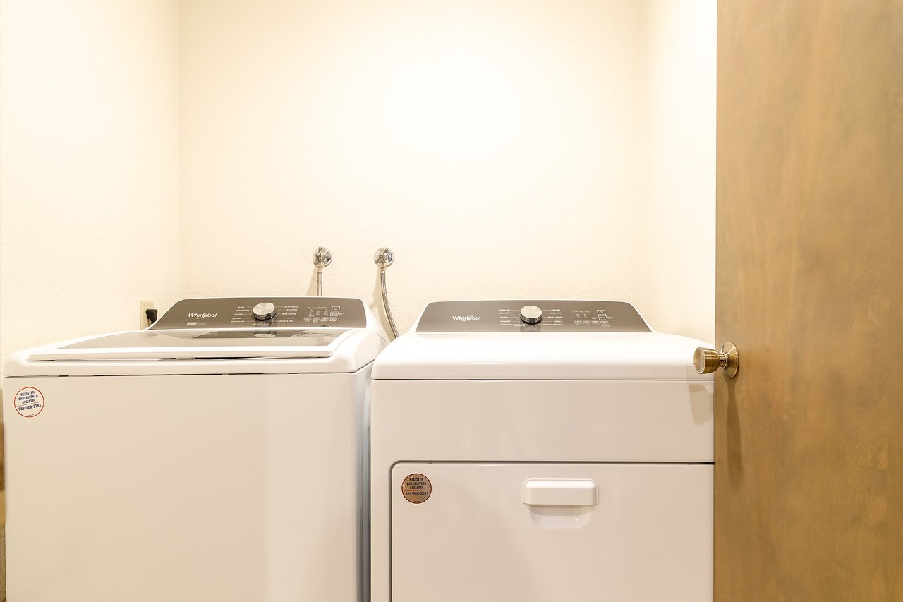 Experience the luxury of your very own dedicated laundry room, providing convenience and efficiency right at your fingertips.