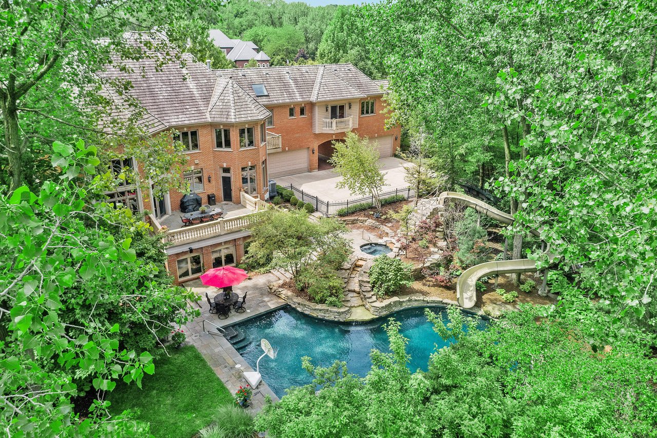 Suburban Chicago 5-bedroom home — with a 56-foot backyard water slide, two large built-in aquariums and neighbor to Jenny McCarthy and Donnie Wahlberg — lists for $1.5 million