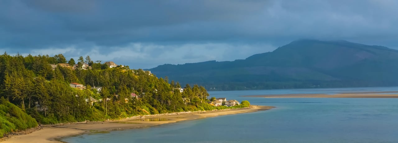 View of the community of Netarts Oregon overlooking Netarts bay on an overcast day