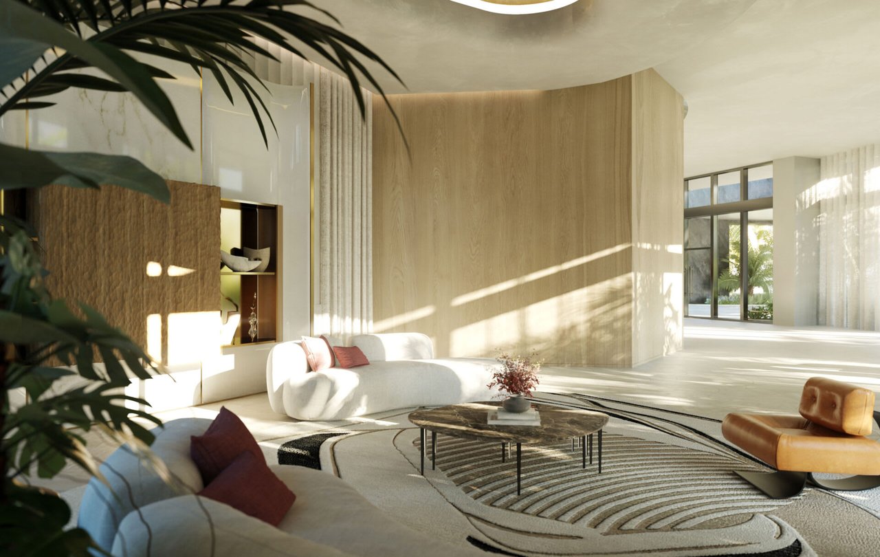 Modern living room with curved white sofas, a patterned rug, and sunlight streaming across warm wood walls.