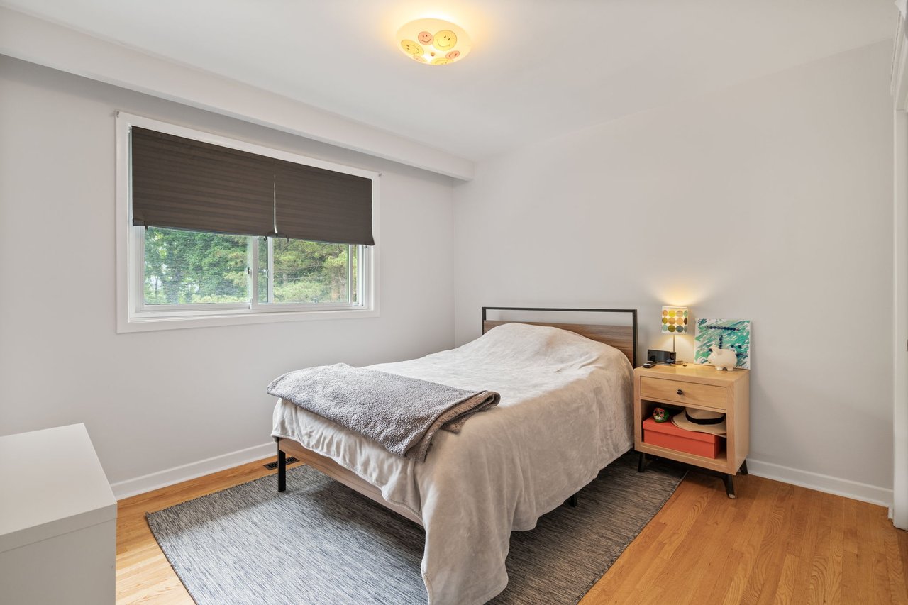 SOLD: Coveted Bayview Woods