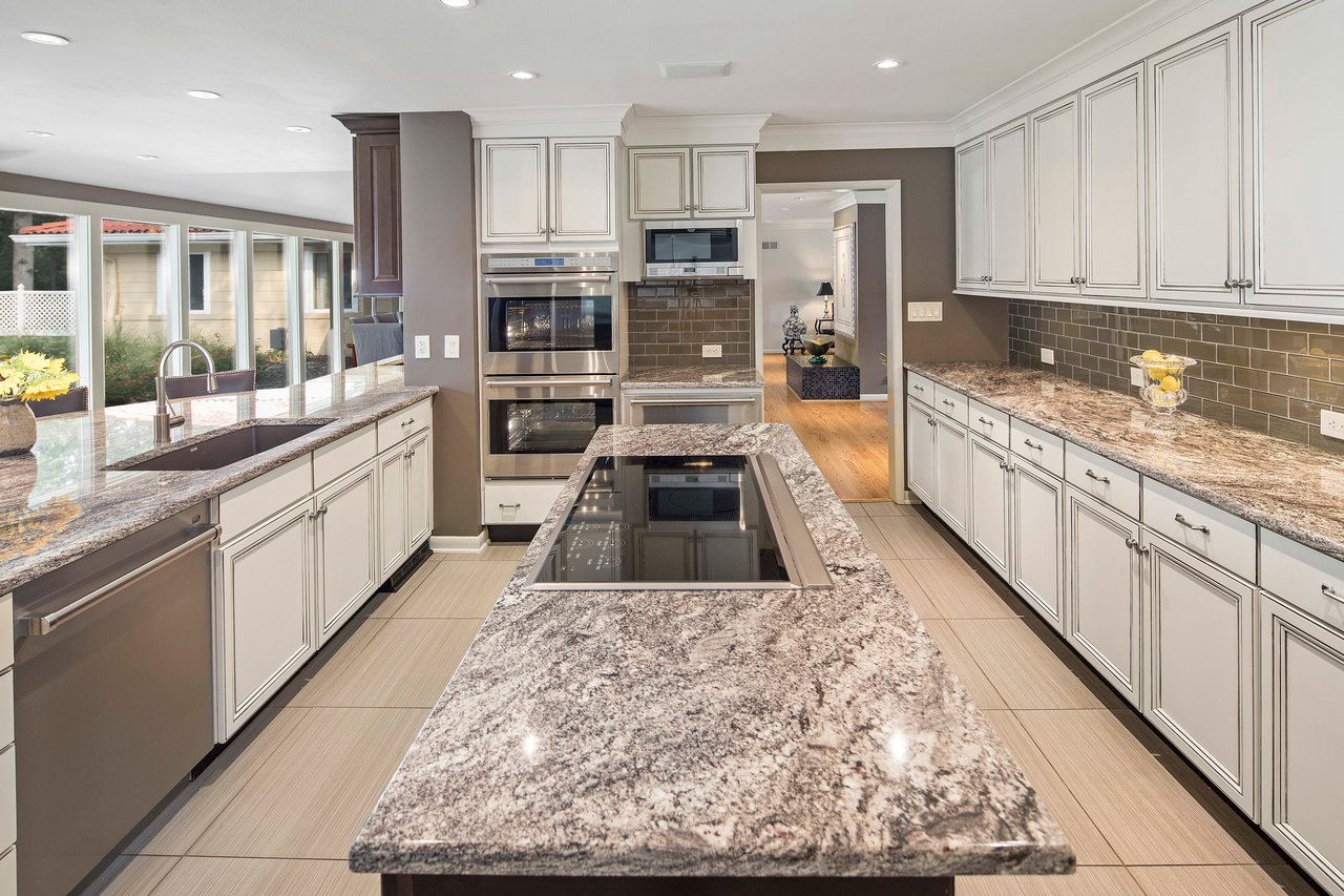 A Special Retreat on a Prized One Acre Lot With Pool and Tennis Court