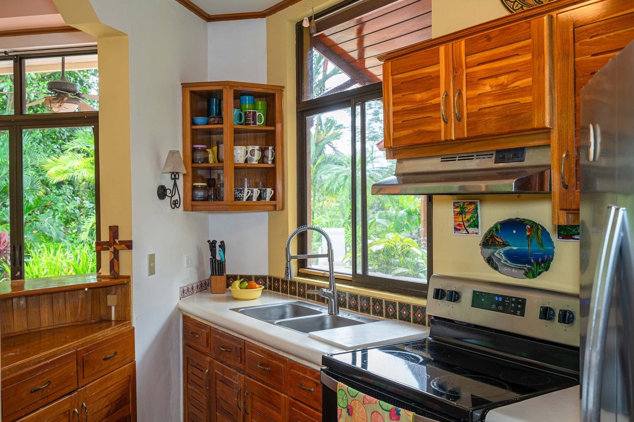 Stunning Tropical Home in Gated community with Hundreds of fruit trees  