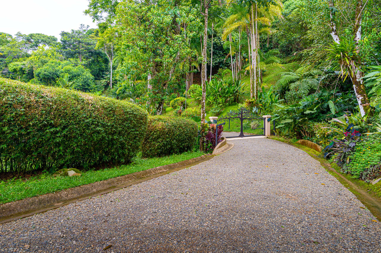 Beautiful 4500 sq ft home on 3.5 acres, gated community, expansive ocean, valley, and jungle views!