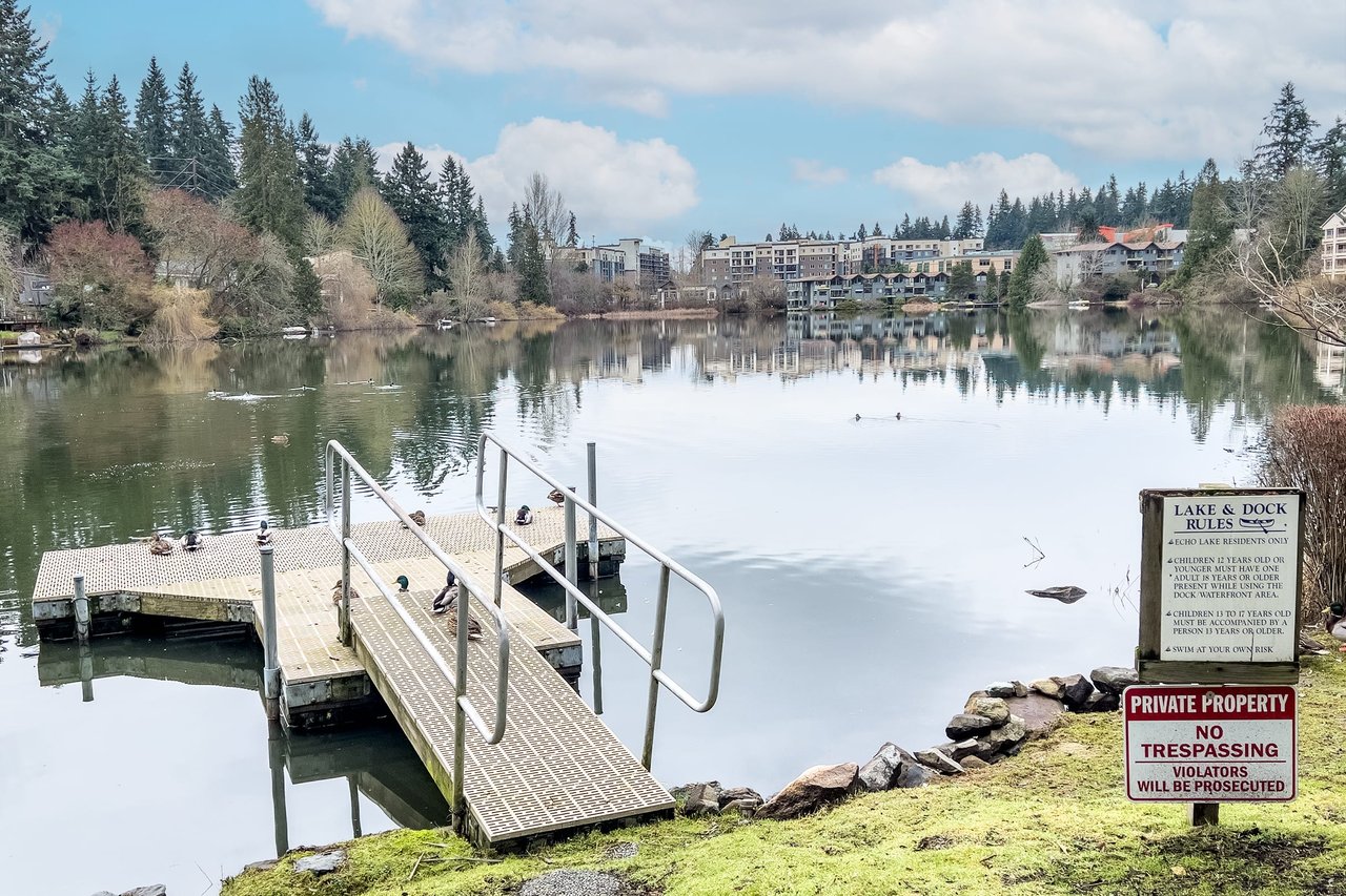 Echo Lake Townhomes boasts its very own private dock, offering residents exclusive access to the tranquil beauty of the lake right at their doorstep.