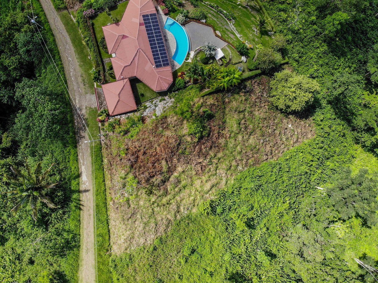 Ocean & Mountain View Half-Acre Lot in Gated Chontales Community