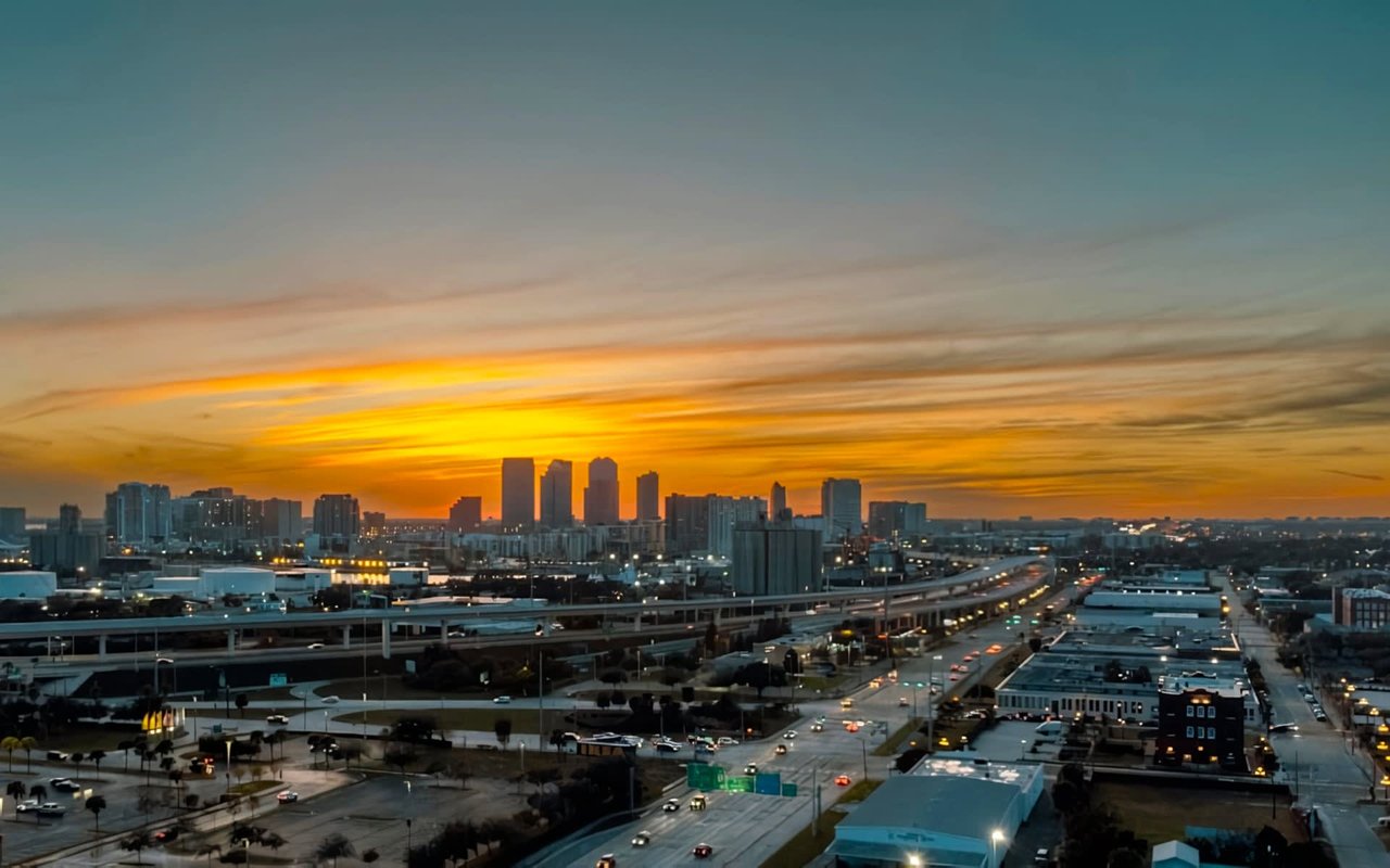  An expansive aerial view of the Tampa, Florida skyline at dusk or dawn