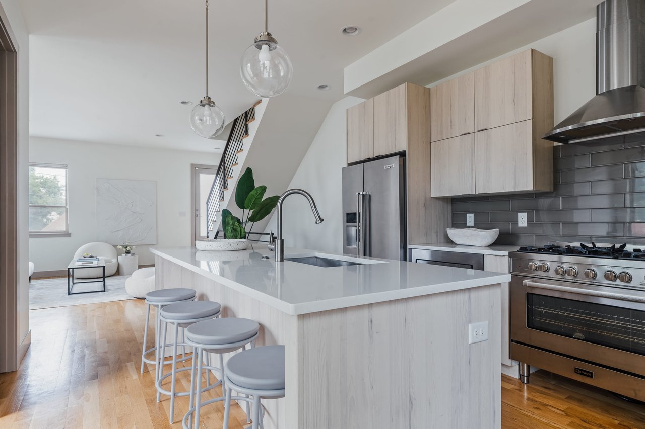 Check it out! Tastefully updated Five Points townhome