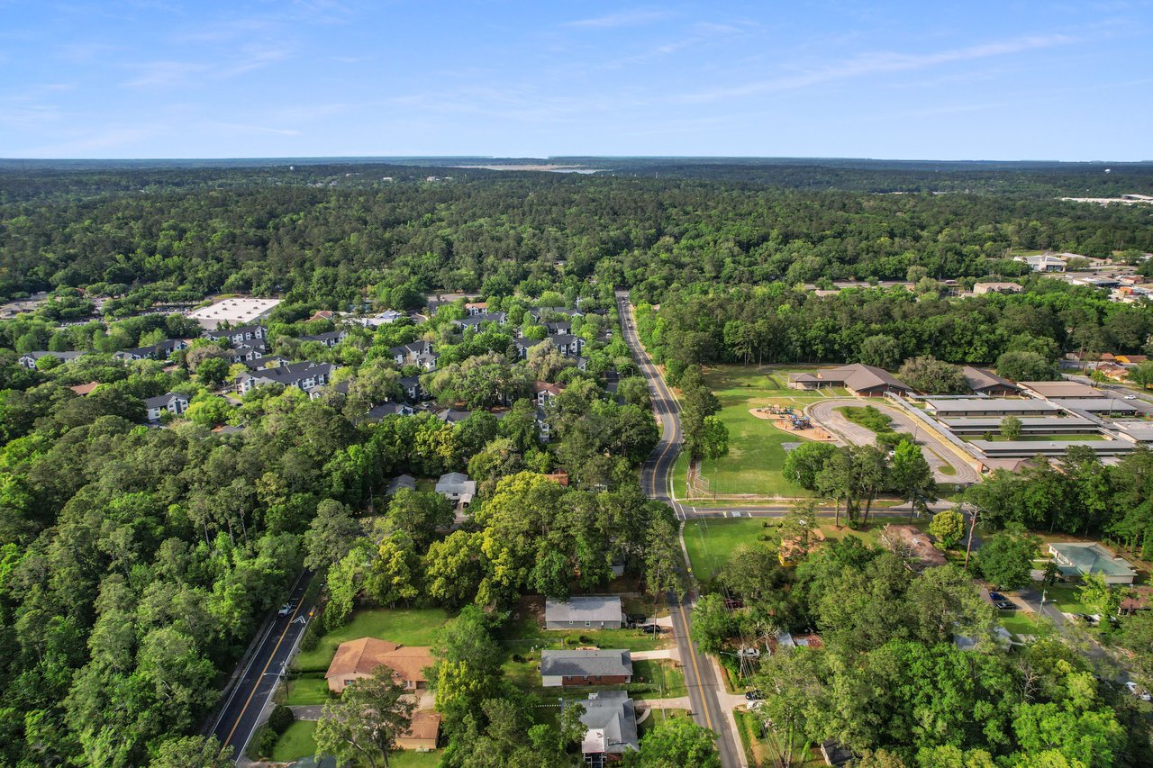 Another aerial view of Griffin Heights, highlighting the layout of houses, streets, and the extensive green spaces within the community.