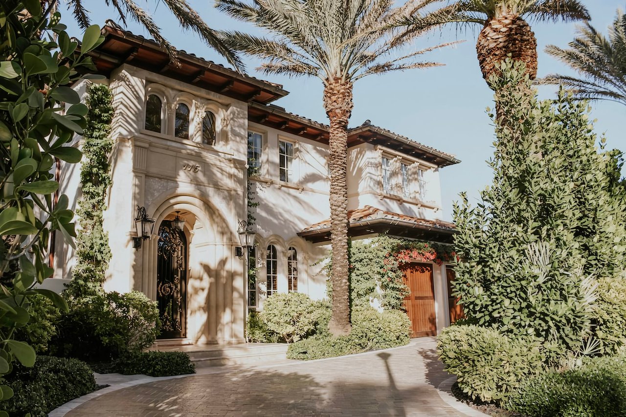 Classic El Cid Home with manicured trees, beautiful architecture and luxury finishes