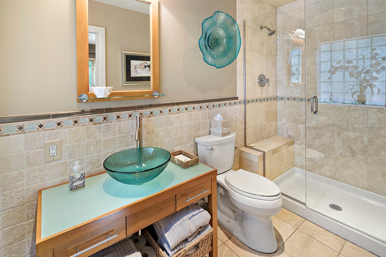 A Special Retreat on a Prized One Acre Lot With Pool and Tennis Court